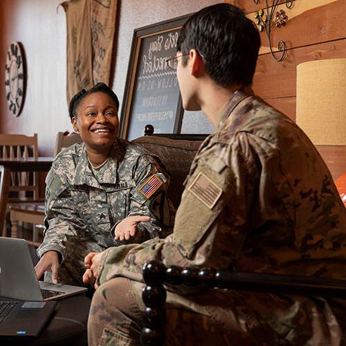 two military students studying in the 翡翠海岸 location coffee shop